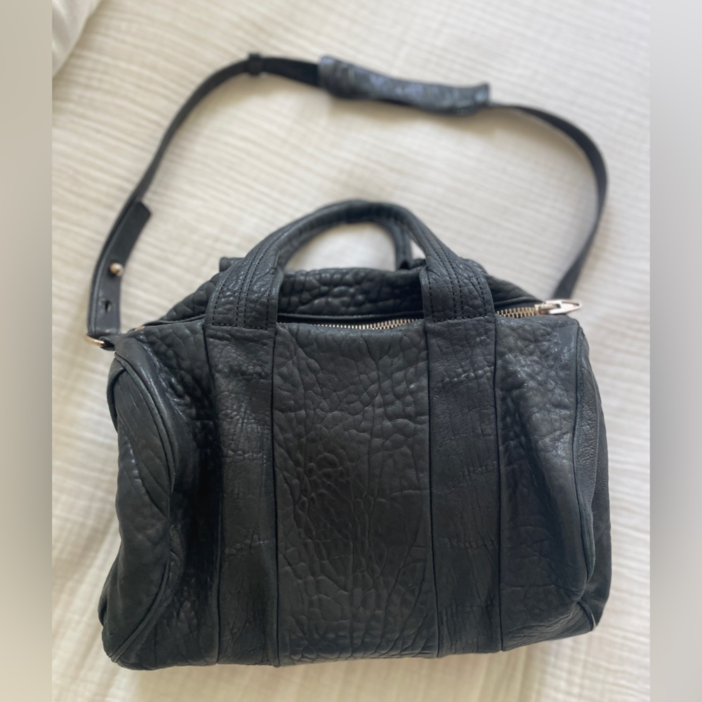Alexander Wang Rocco Duffle Bag – Black Pebbled Leather with Rose Gold Studs